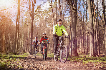 Image showing Young people riding bikes