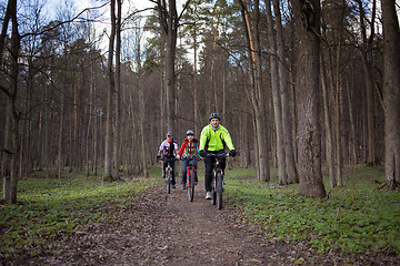Image showing Young people riding bikes