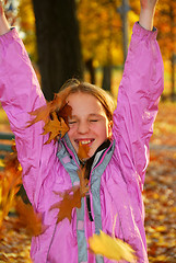 Image showing Girl with leaves