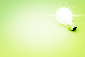 Image showing Background with lit lightbulb