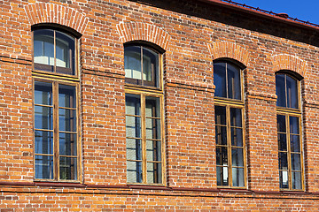 Image showing Red brick retro house with windows