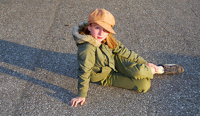 Image showing Girl sit outside