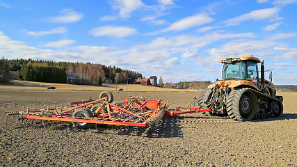 Image showing Challenger MT765C Tracked Tractor and Cultivator on Field