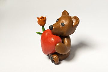 Image showing Plasticine bear with flower and eight