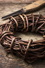 Image showing licorice rolled in coil on wooden background