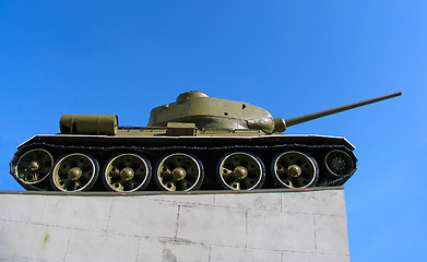 Image showing Old russian tank on the green grass