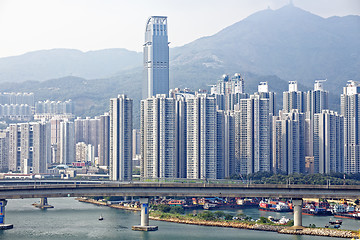 Image showing high speed train on bridge in hong kong downtown city