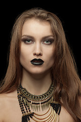 Image showing Closeup portrait of a gothic young woman with black lips