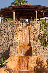 Image showing  wooden gazebo with a waterfall, Egypt