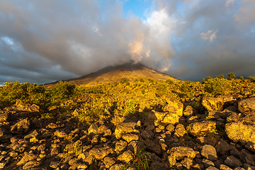 Image showing Clouds over the volcanic mountain 