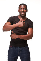 Image showing Portrait of handsome young smiling african man 