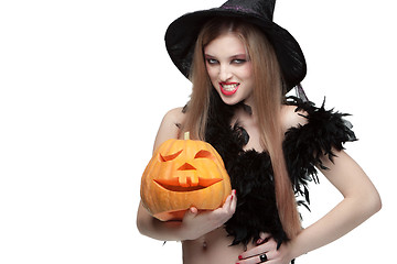 Image showing Girl with Halloween pumpkin on white background