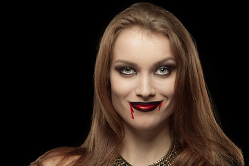 Image showing Close-up portrait of a pale gothic vampire woman