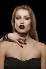 Image showing Gothic woman with hand of vampire on her neck