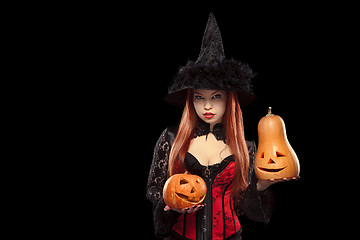 Image showing Girl with Halloween pumpkin on black background