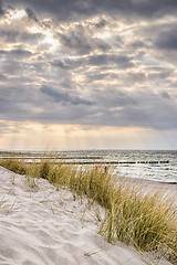 Image showing Coast of Baltic Sea with dark clouds