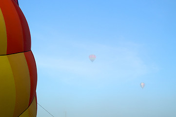 Image showing hot air balloons in the morning fog