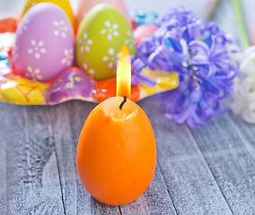 Image showing easter eggs and candle
