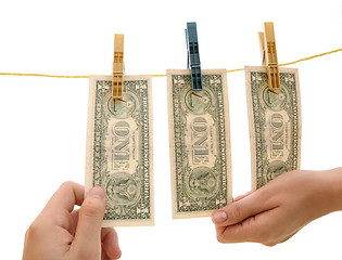 Image showing Dollars on the wire