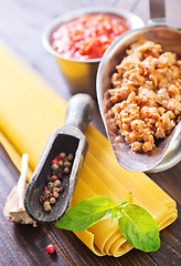 Image showing dough for lasagna and ingredients for lasagna