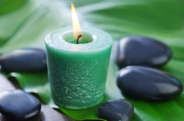 Image showing candle and stones