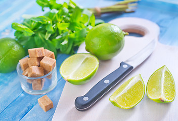 Image showing fresh limes with sugar and mint