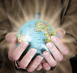 Image showing Globe in a girl's hands