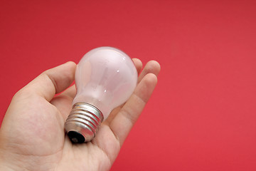 Image showing Background with lit lightbulb