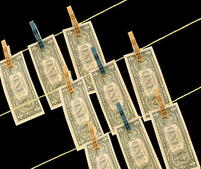 Image showing Dollars on the wire