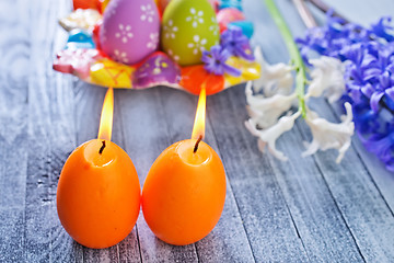 Image showing easter eggs and candle