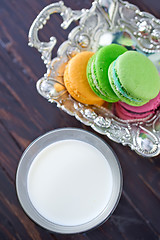 Image showing milk in glass and color macaroons