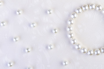 Image showing White pearls necklace on white paper 