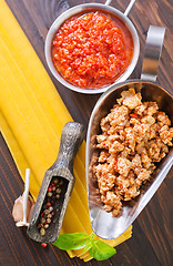 Image showing dough for lasagna and ingredients for lasagna