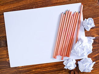 Image showing paper on wooden background