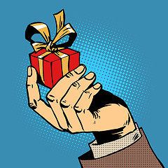 Image showing gift in his hand a small box pop art comics retro style Halftone