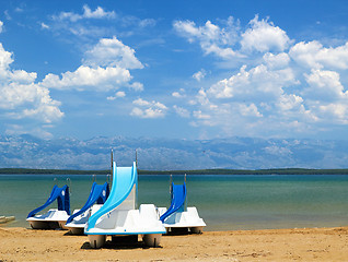 Image showing Colorful pedalos on a beautiful tropical beach