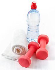 Image showing Fitness equipment dumbbells, towel and bottle of water