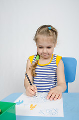 Image showing Four-year girl draws pencils