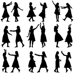 Image showing Black silhouettes of beautiful womans on white background. 