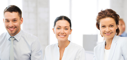 Image showing business team discussing something in office