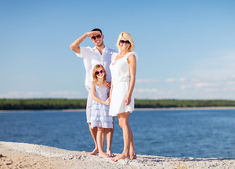 Image showing happy family with blue sky