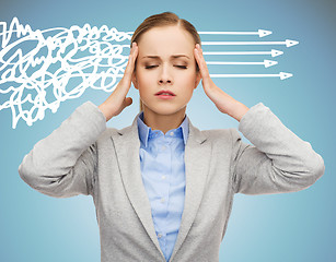 Image showing stressed woman covering her ears with hands