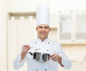 Image showing happy male chef cook with pot and spoon