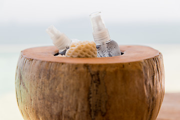 Image showing bowl with moisturizing spray at hotel beach or spa