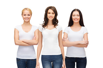 Image showing group of smiling women in blank white t-shirts