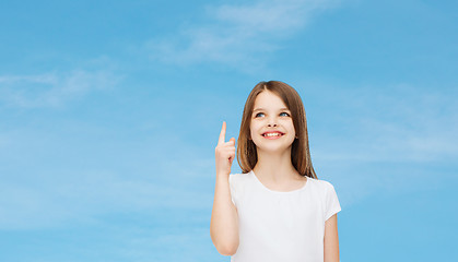 Image showing smiling little girl in white blank t-shirt