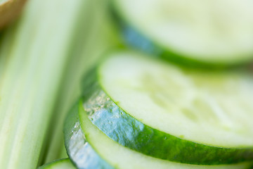 Image showing close up of cucumber slices and celery