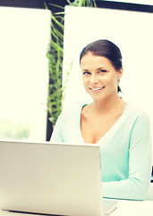 Image showing happy woman with laptop computer