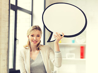 Image showing smiling businesswoman with blank text bubble