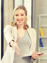 Image showing woman with an open hand ready for handshake